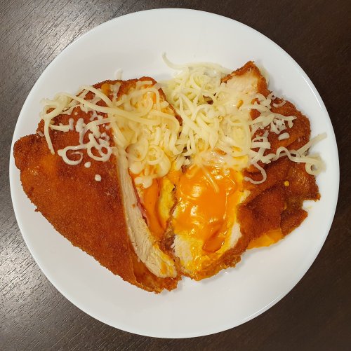 Tarjával-cheddar sajttal töltött csirkemell rántva